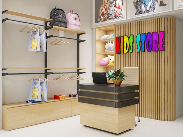 Logo thương hiệu shop đầy màu sắc thu hút ánh nhìn của trẻ nhỏ trong thiết kế shop thời trang trẻ em